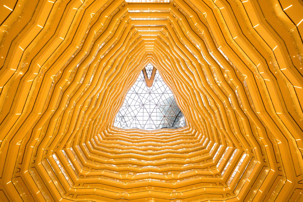 HD Yellow Triangle Abstract Wallpaper with Geometric Grid Background
