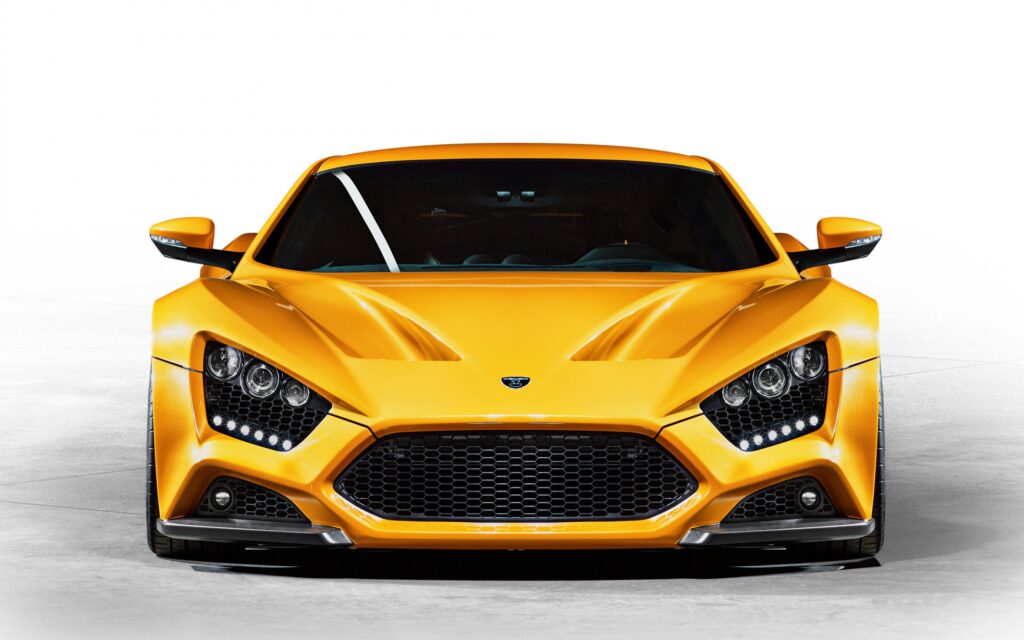Striking Yellow Zenvo ST1 Sports Car Wallpaper on White Background