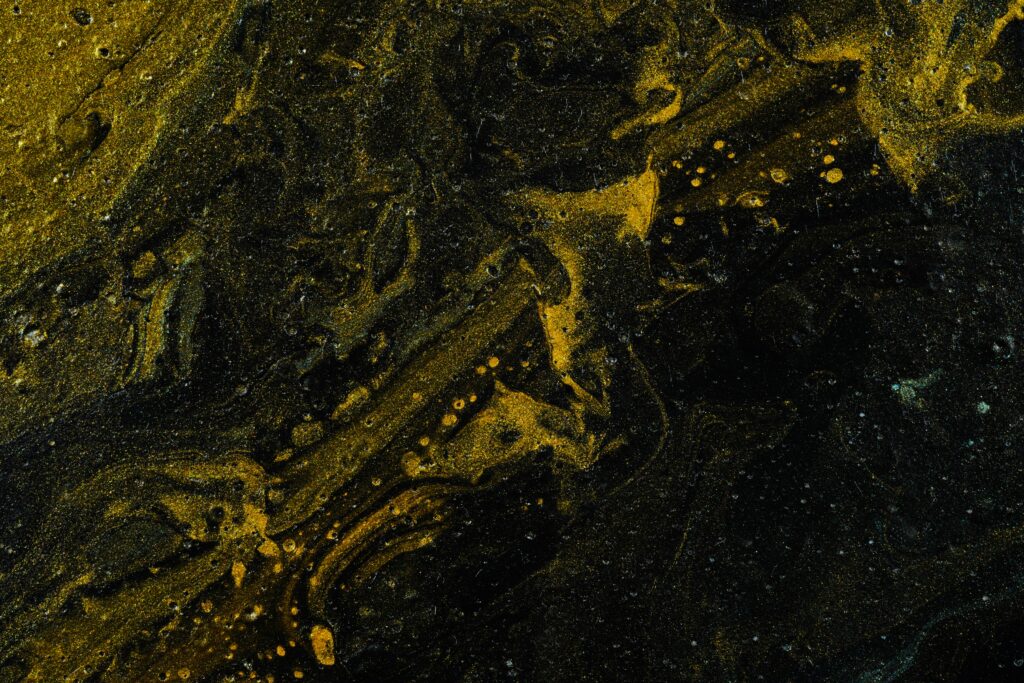 Vivid Abstract Wallpaper: Yellow & Black Paint Stains, Cosmic Texture