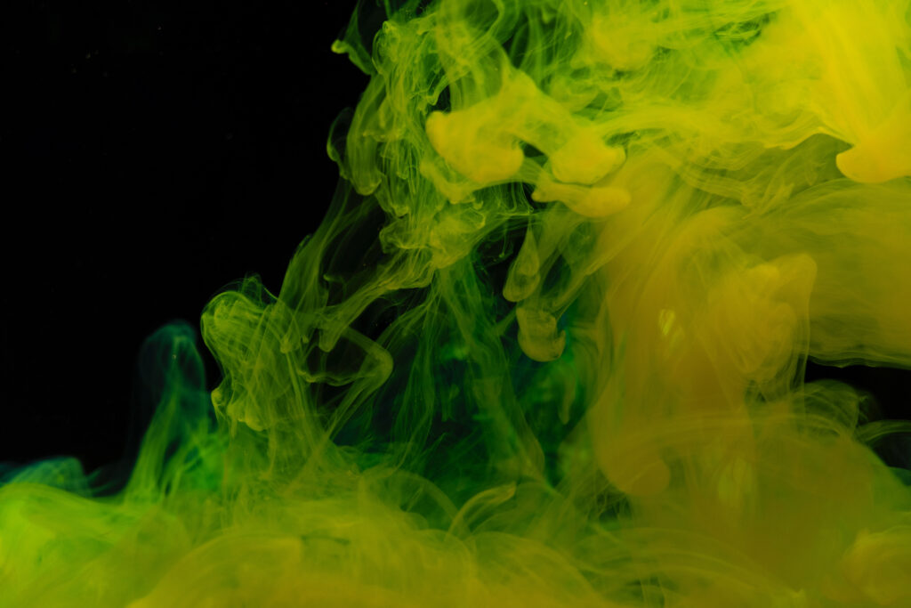 Stunning Yellow & Green Ink Macro Wallpaper on Black Background