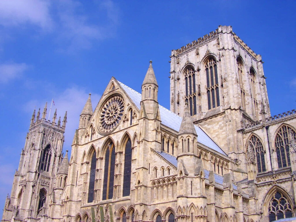 York Minster Cathedral Wallpaper: Gothic Architecture & Blue Sky