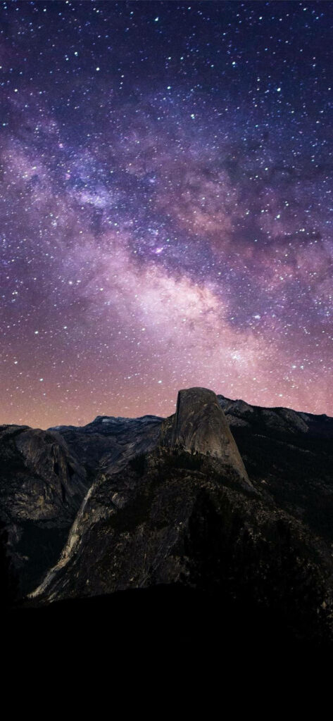 Serene Starry Night iPhone 11 Wallpaper: Rugged Mountain View