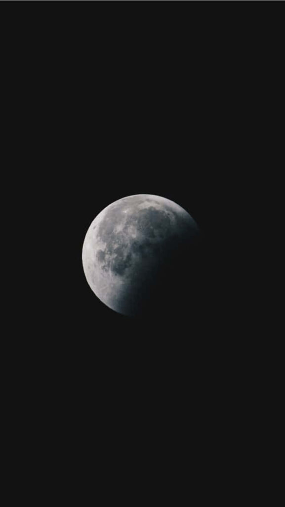 Stunning iPhone Wallpaper: Serene Moonlit Midnight Sky Background