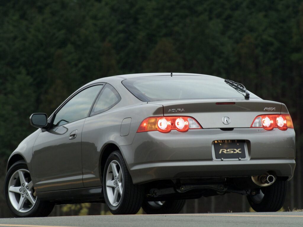 Elegant 2002 Acura RSX Wallpaper: Stylish Car in Serene Setting