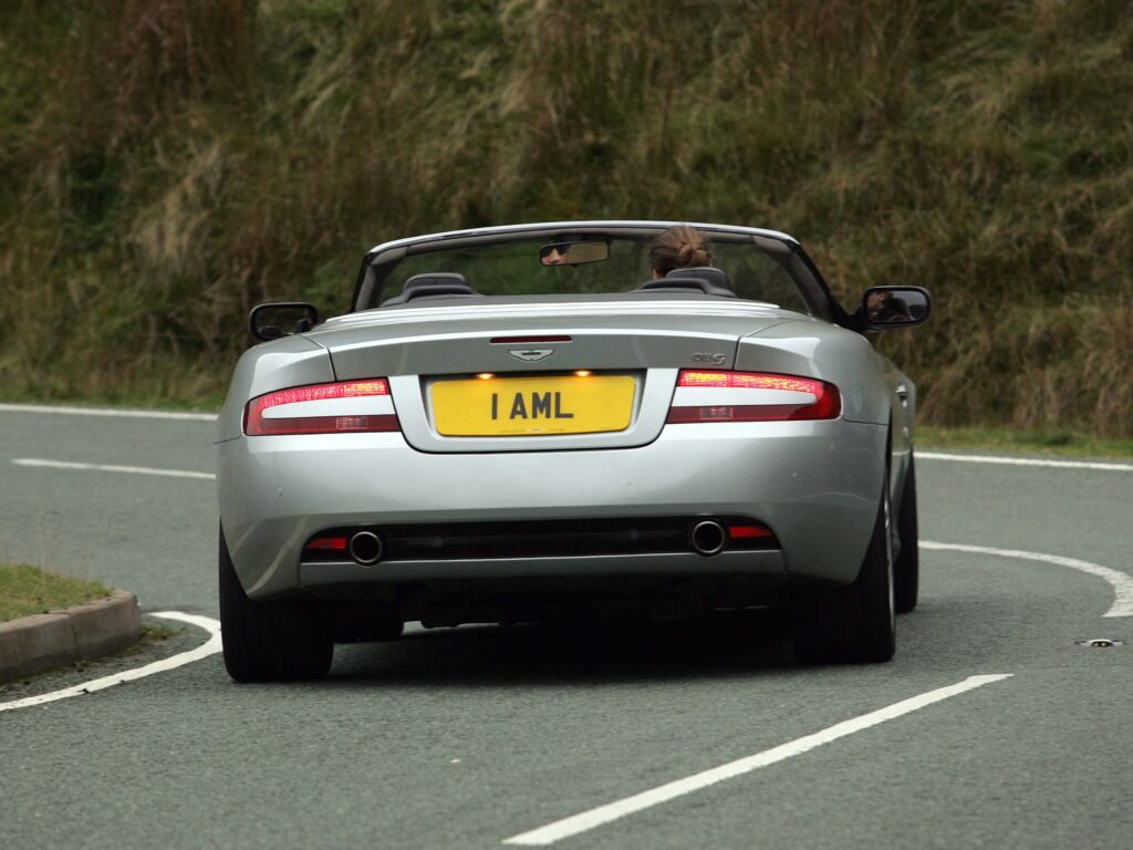 2004 Metallic Silver Aston Martin DB9 Rear View Wallpaper