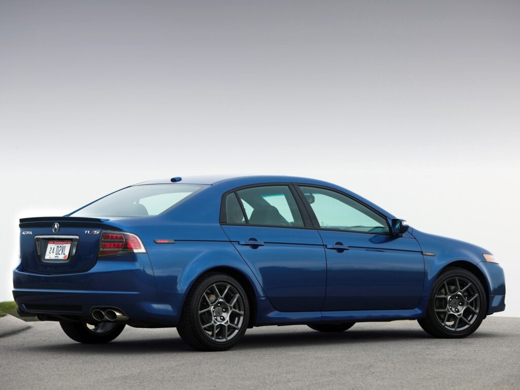 Sleek Blue 2007 Acura TL Wallpaper with Clear Sky Background