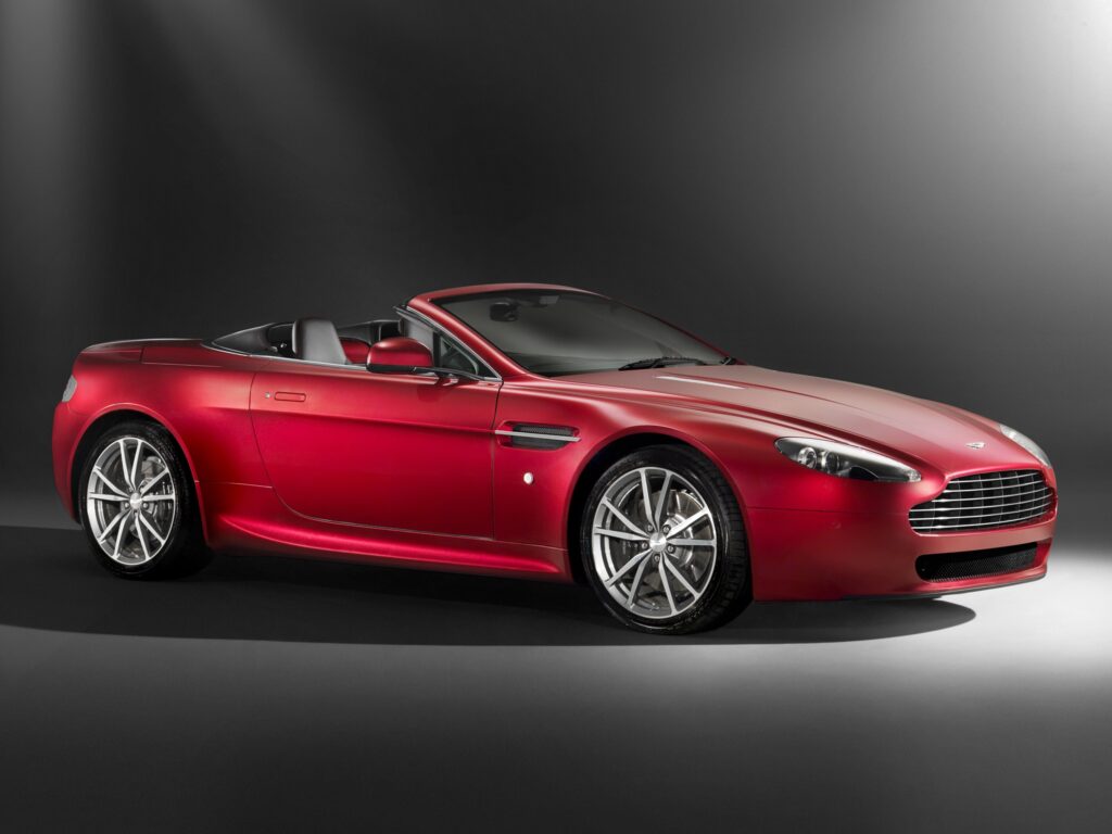 Elegant 2008 Red Aston Martin V8 Vantage Side View Wallpaper