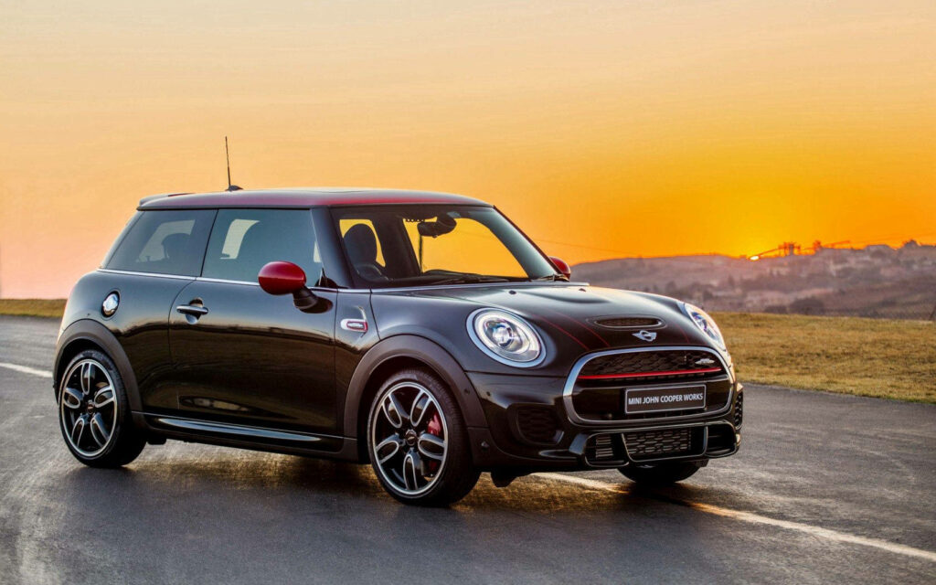 Stylish Black Mini Cooper Wallpaper at Sunset - Dynamic Design