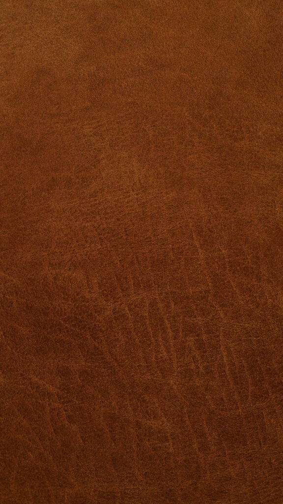 Rich Brown Leather Wallpaper: Stylish Texture with Natural Grain Patterns