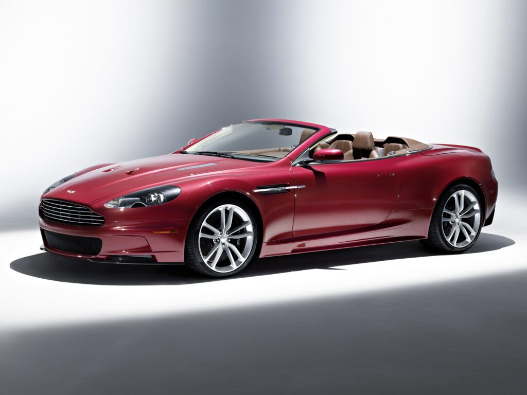 2009 Aston Martin DBS: Sleek Dark Red Convertible Side View Wallpaper