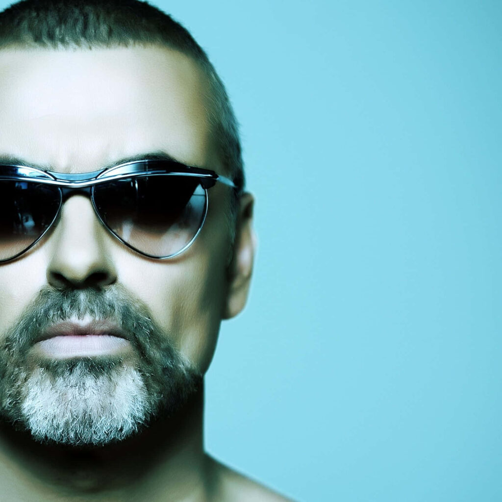 Stylish George Michael Wallpaper: Iconic Look & Cool Blue Background