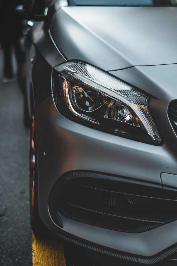 Close-Up of Stylish Gray Car Headlight - High-Resolution Wallpaper
