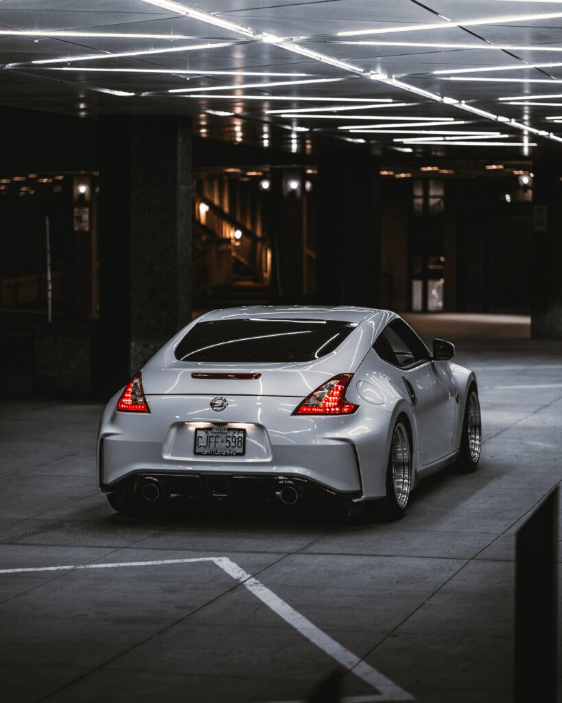 Sleek Gray Nissan 350Z: Stylish Rear View in Urban Setting Wallpaper