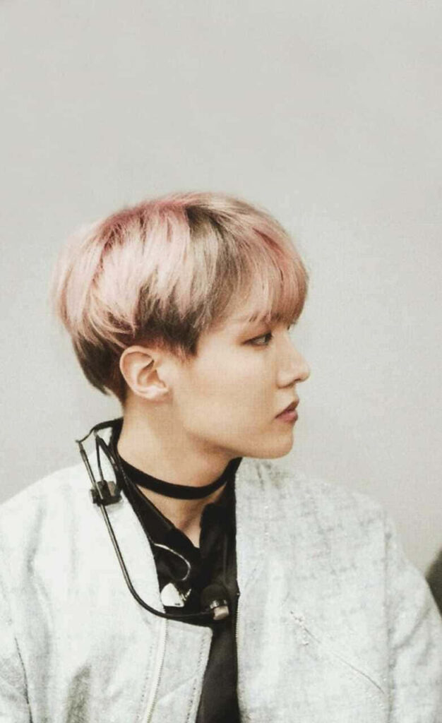 Elegant J-Hope Side Profile Wallpaper with Pink Hair & Calm Vibe