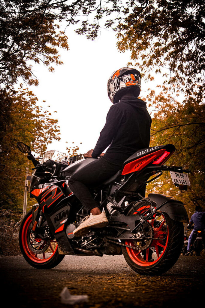 Autumn KTM Bike Wallpaper: Rider in Serene Outdoor Setting
