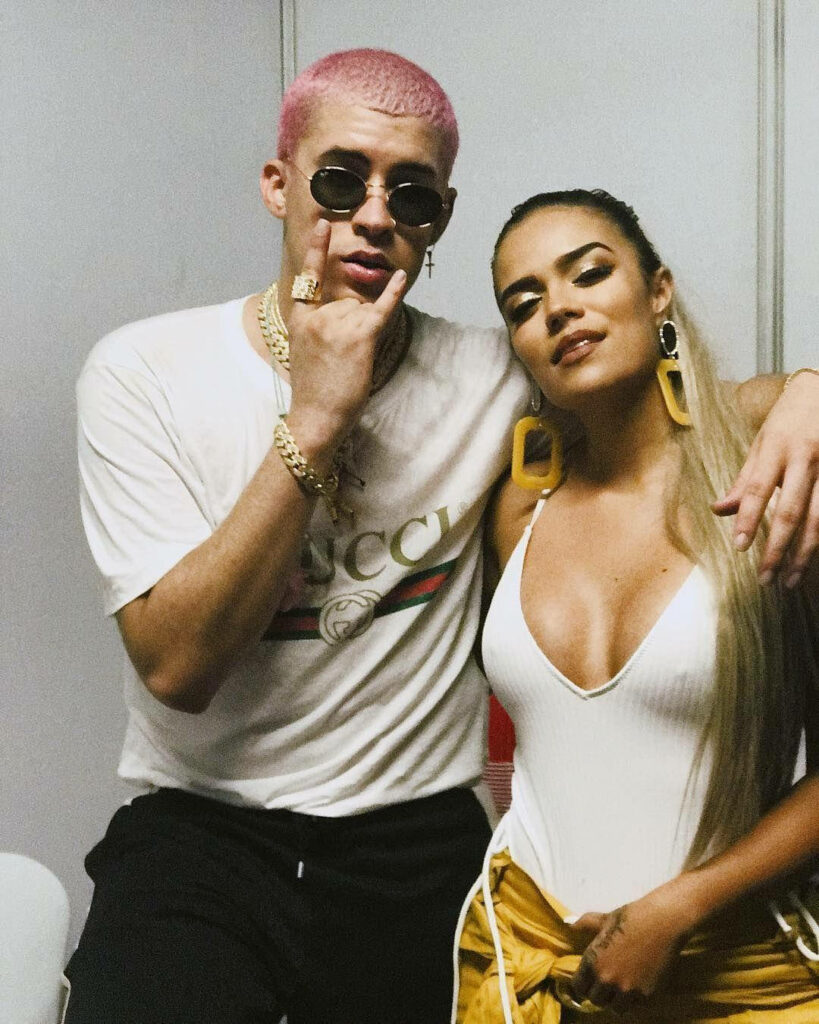 Stylish Wallpaper: Karol G & Companion Exuding Power Couple Vibes