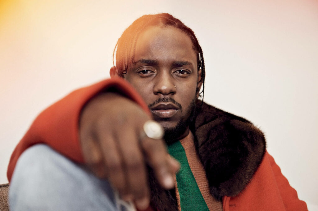 Close-Up Kendrick Lamar: Intense Wallpaper with Warm Colors
