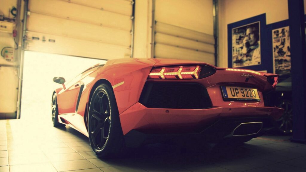 Sleek Lamborghini Wallpaper in Stylish Garage - 1920x1080