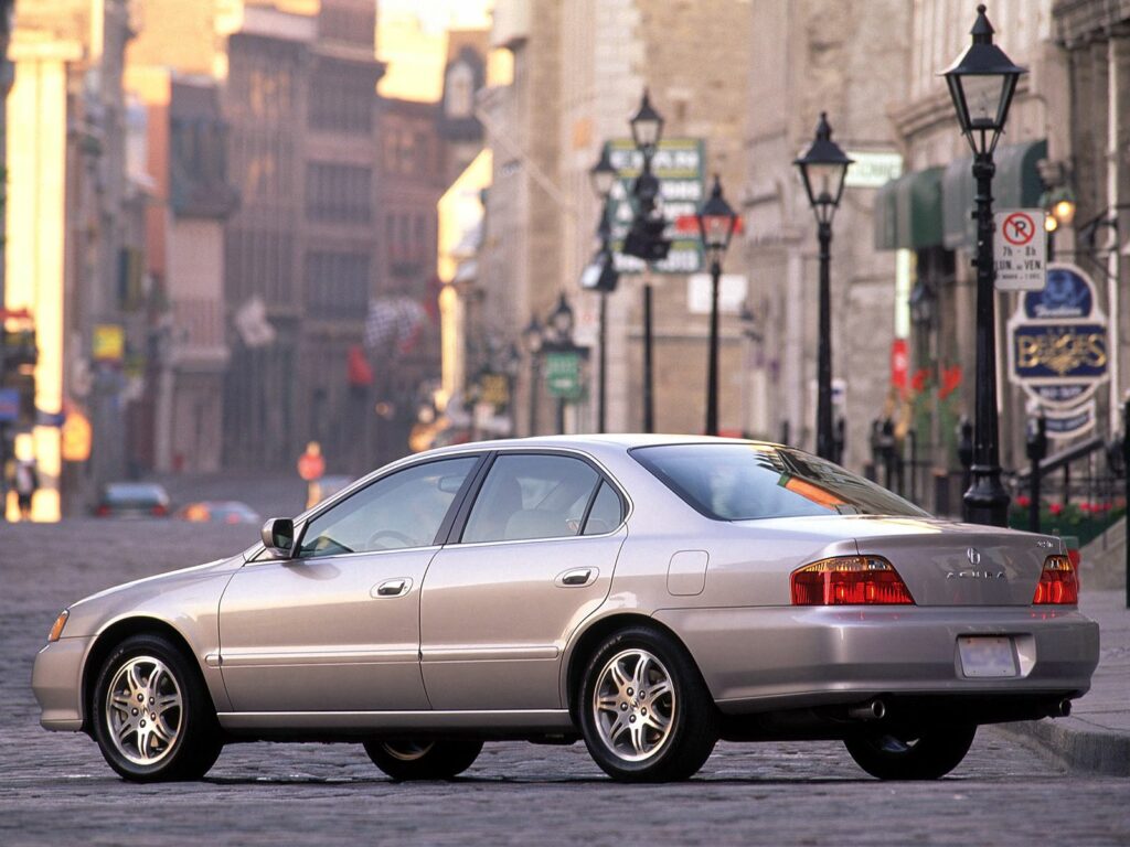 Stylish Metallic Gray Acura TL in Urban Street Scene at Night Wallpaper