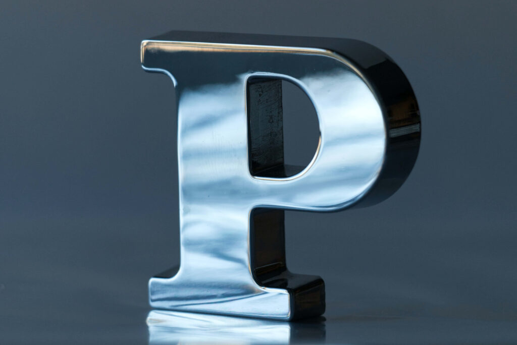 Modern Metallic Letter P Wallpaper: Sleek & Reflective Design