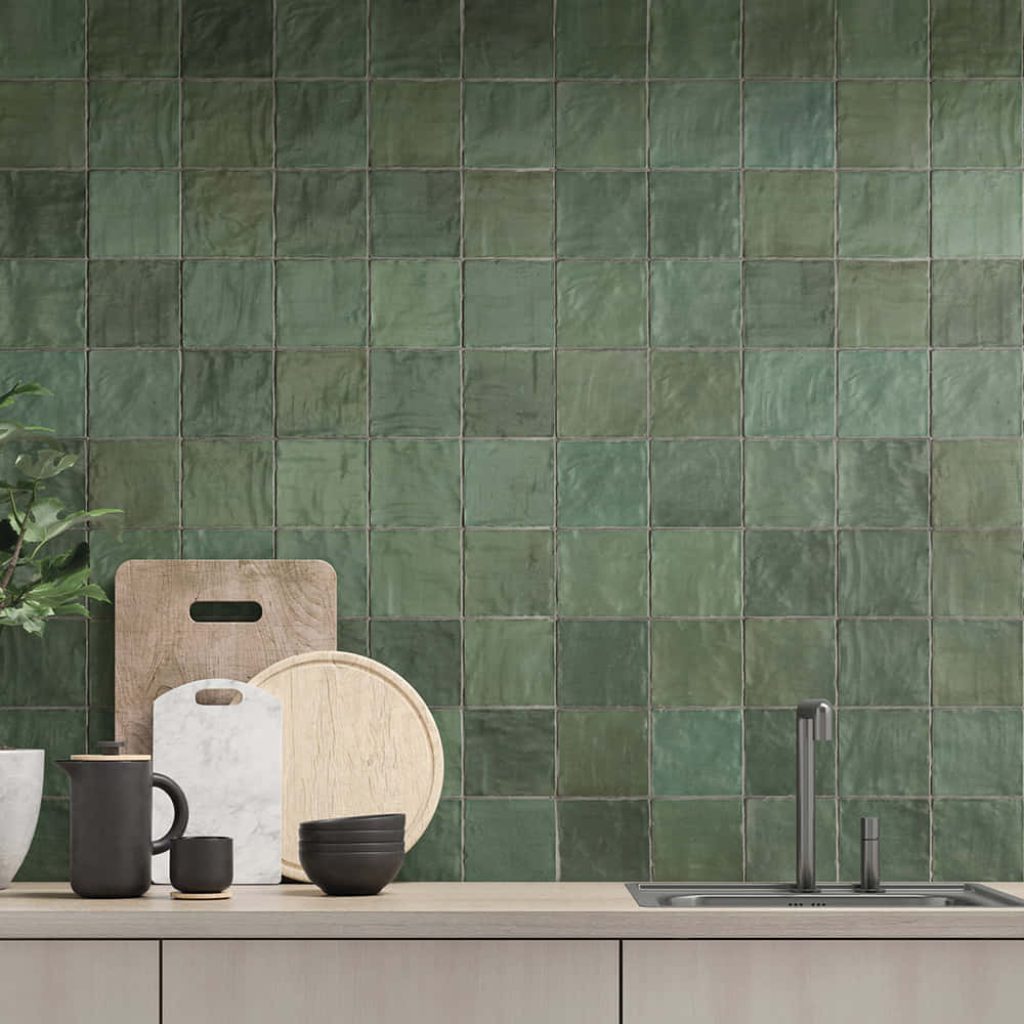 Moss green square tile backsplash with textured handcrafted look in modern kitchen design Wallpaper