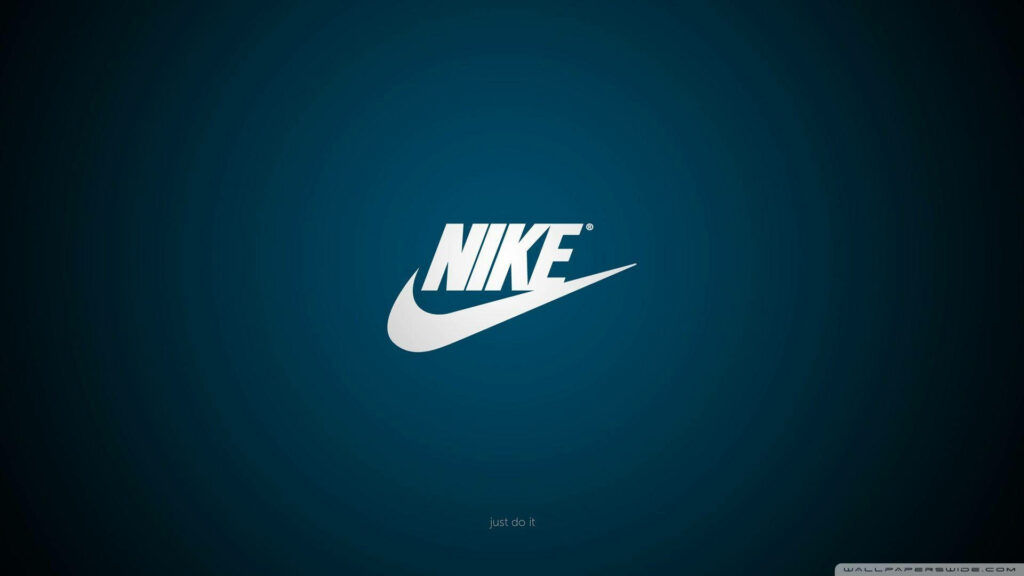 Cool Nike Logo on Dark Blue Gradient: A Striking Wallpaper