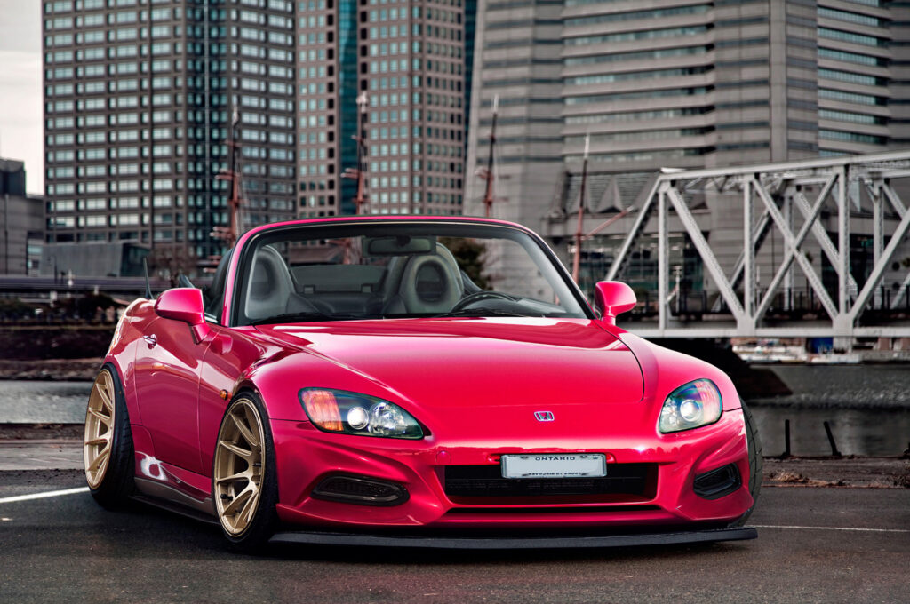 Red Honda S2000 Roadster in Urban Setting - Stylish Wallpaper