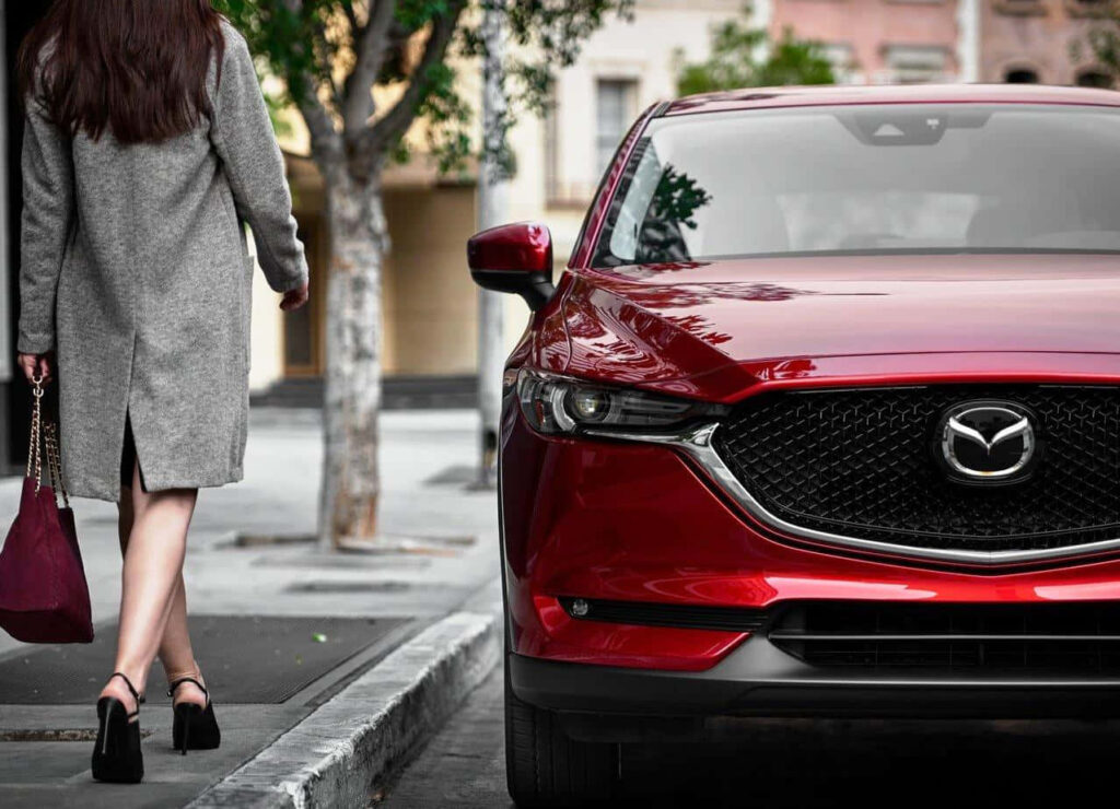 Stylish Red Mazda CX-5 Wallpaper in Urban Elegance