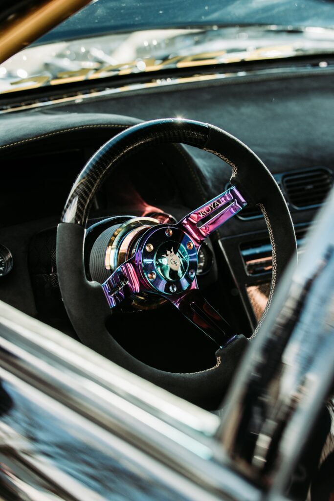 Close-Up of Retro-Modified Steering Wheel - Stylish Car Interior Wallpaper