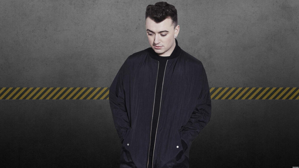 Stylish Sam Smith Wallpaper: Black Jacket on Gray Background