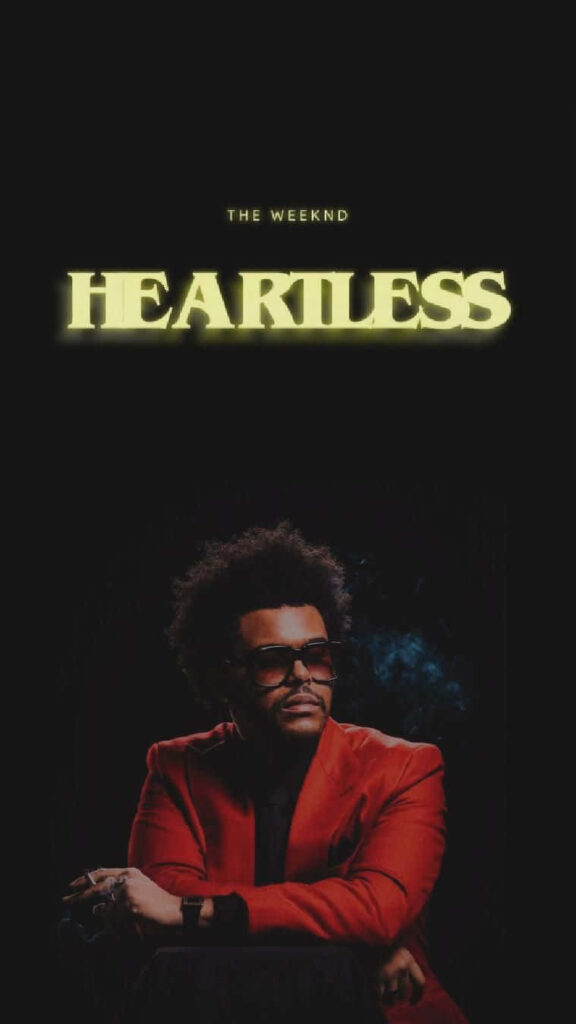 Stylish Wallpaper: The Weeknd in Red Suit with Heartless Glow