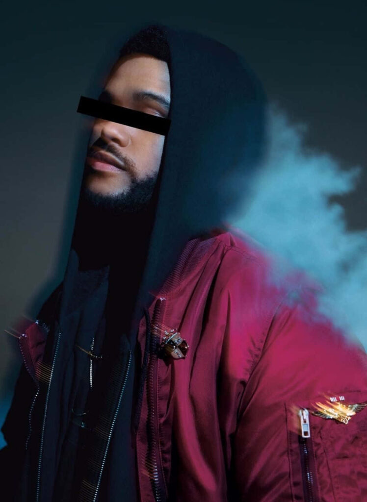Stylish The Weeknd iPhone Wallpaper: Captivating Moody Background