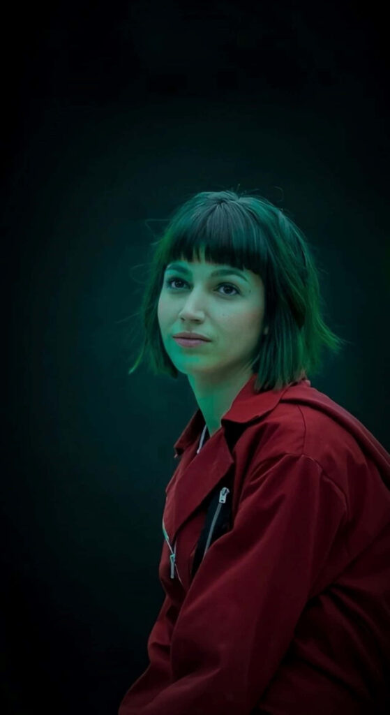 Red Royalty: Stunning Mobile Wallpaper of Úrsula Corberó Embracing Tokyo's Iconic Attire in Money Heist