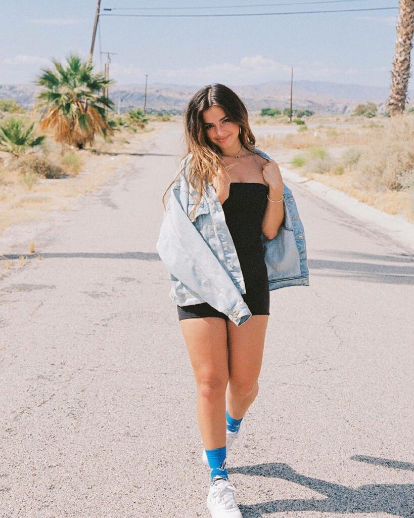 Stylish Wallpaper: Addison Rae in Black Outfit on Desert Road