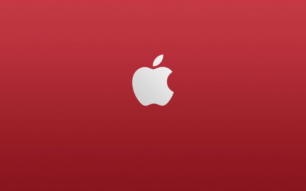 A Chic Wallpaper featuring a White Apple Logo on a Striking Red Background