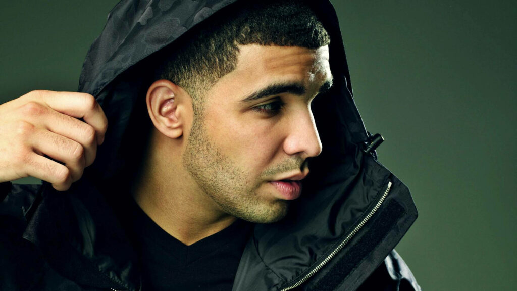 Slick and Suave: Drake's Headshot Wallpaper in Side View