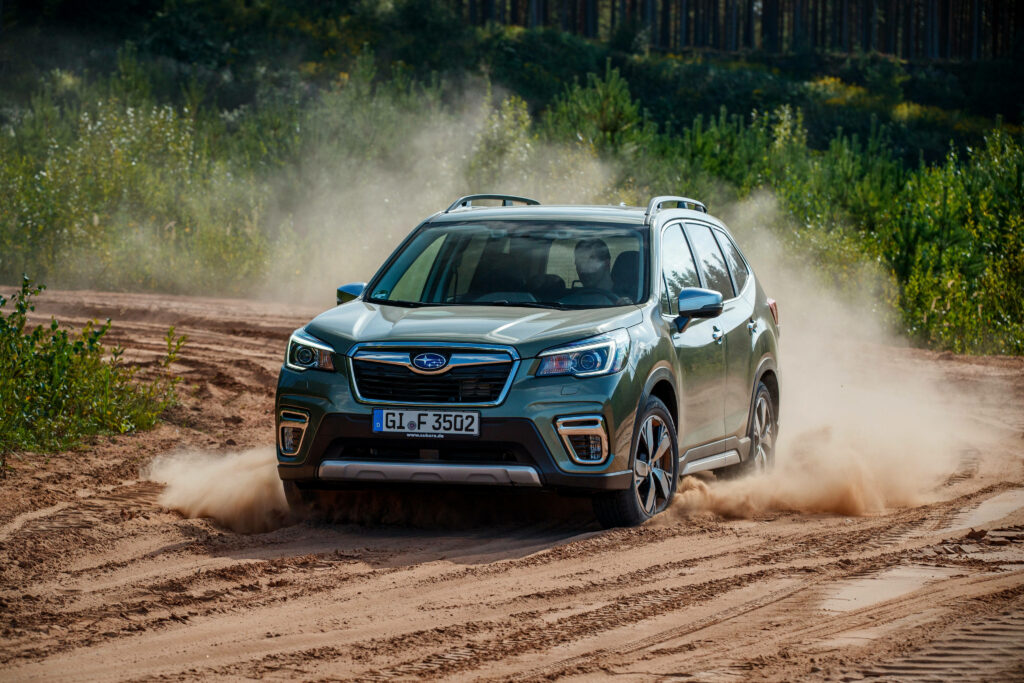 Subaru Forester Off-Road Wallpaper: Rugged Adventure in Greenery