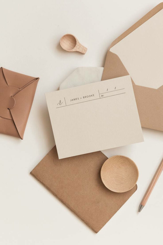 Writing Essentials: Chic Beige Aesthetic Stationery Set with Stylish Pen and Compact Pouch Wallpaper