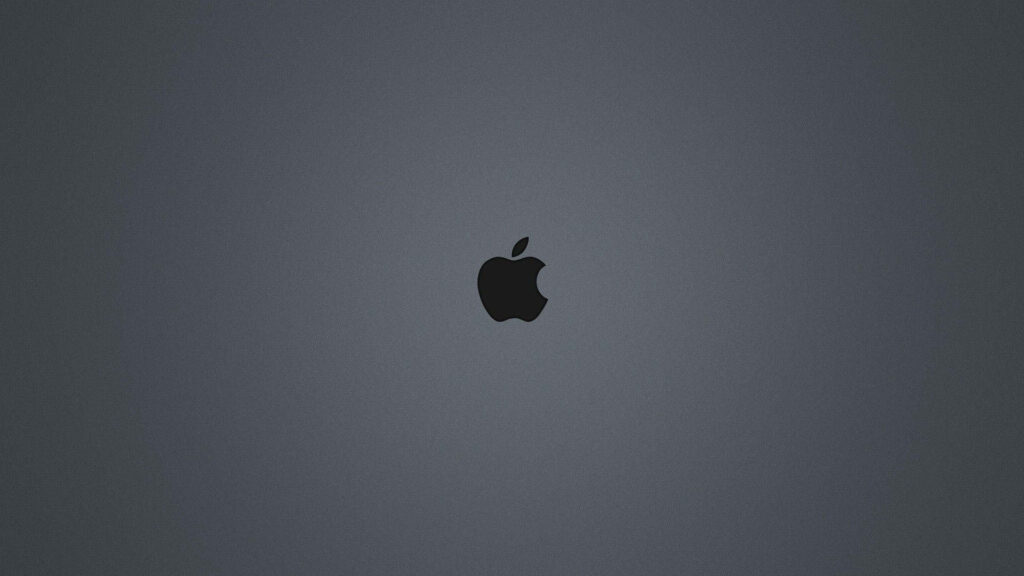Dark Elegance: A Minimalistic Black Apple Logo on Gray Backdrop Wallpaper