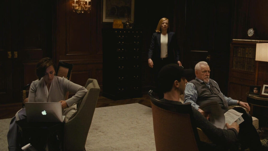 Succession Cast: Key Characters in Dramatic Wallpaper Background