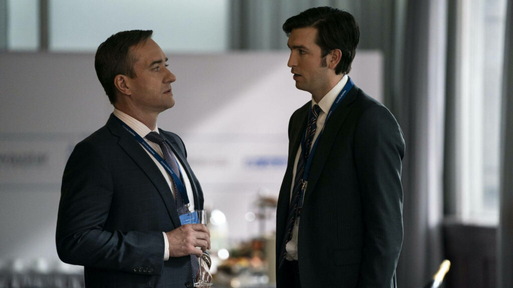 Succession Wallpaper: Greg & Tom's Engaging Moment in the Office
