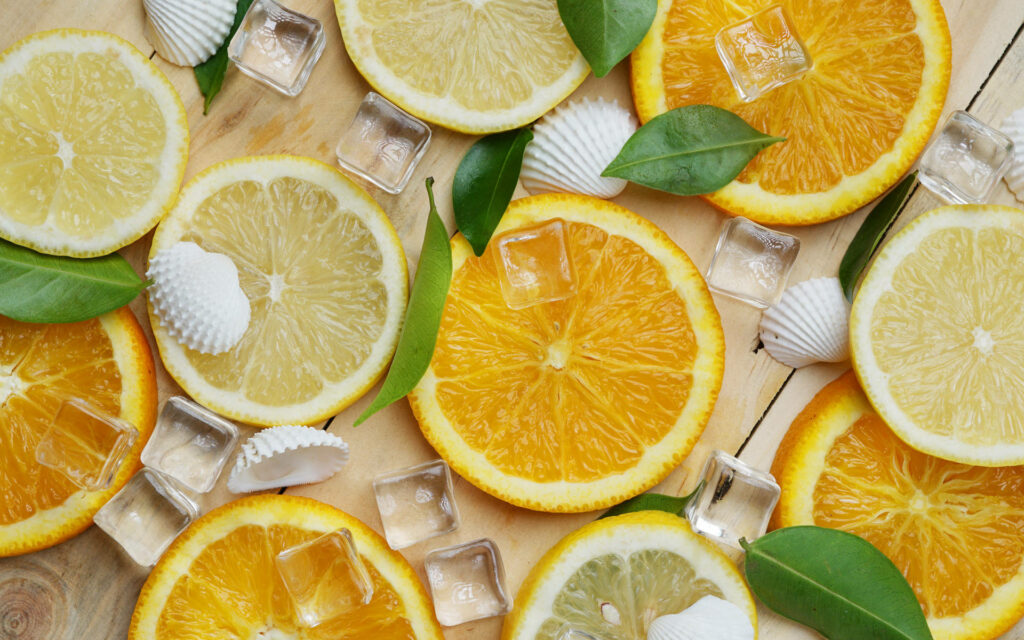 Summer's Zesty Delight: Captivating Citrus Slices with Chilled Serenity Wallpaper