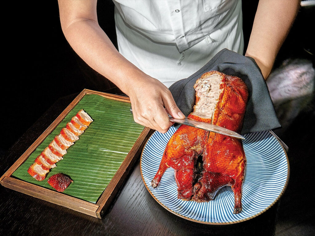 Sumptuous Peking Duck Wallpaper: Expertly Served & Sliced Delight