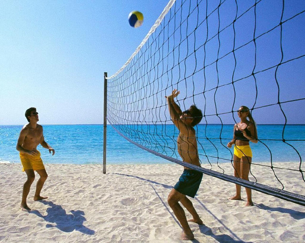 Vibrant Beach Volleyball Wallpaper – Sunny Costa Brava, Spain