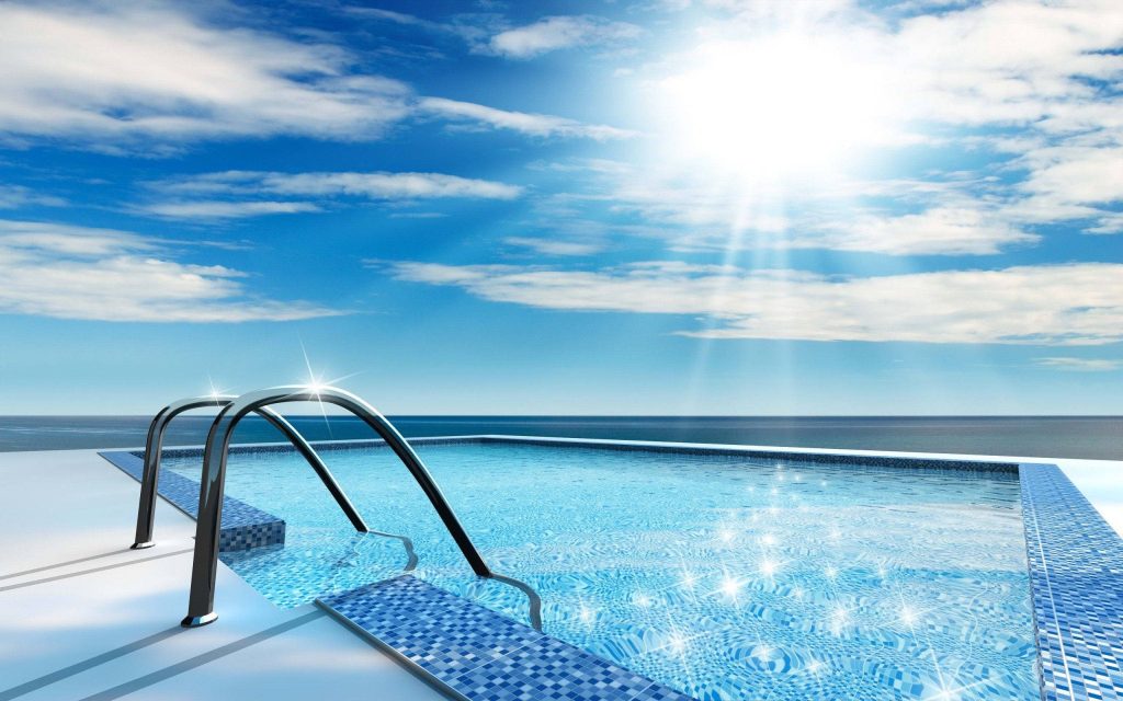 Sunny infinity pool with chrome ladder and ocean view bright summer vacation wallpaper