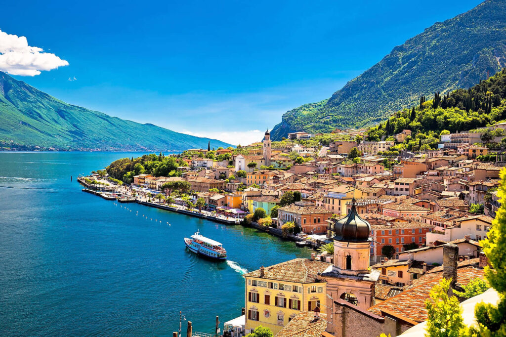 Sunny Lago di Garda Wallpaper: Scenic Blue Waters & Quaint Town