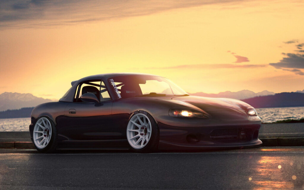 Majestic Jdm Mazda Cruise: Captivating Sunset in 4K Resolution Wallpaper
