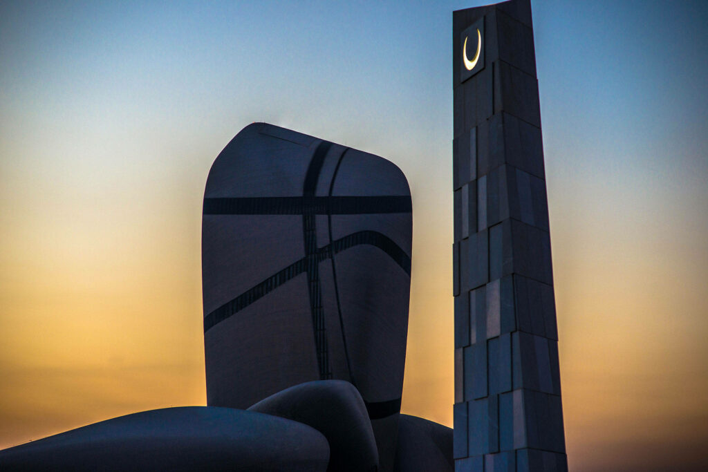 Serenity at King Abdul Aziz Historical Centre: Majestic High Rise Building Embracing a Mesmerizing Sunset in Saudi Arabia's Cultural Heartland Wallpaper