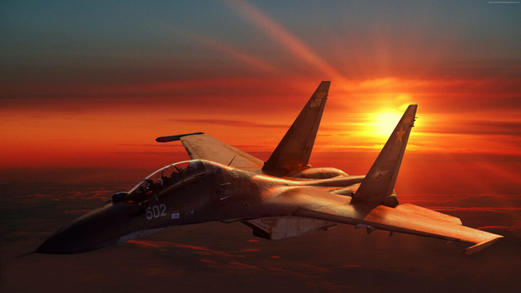 Dramatic Sunset Stunner: Showcasing the Magnificent Sukhoi Su-30 Fighter Jet amidst Majestic Fighter Jets Scenery Wallpaper