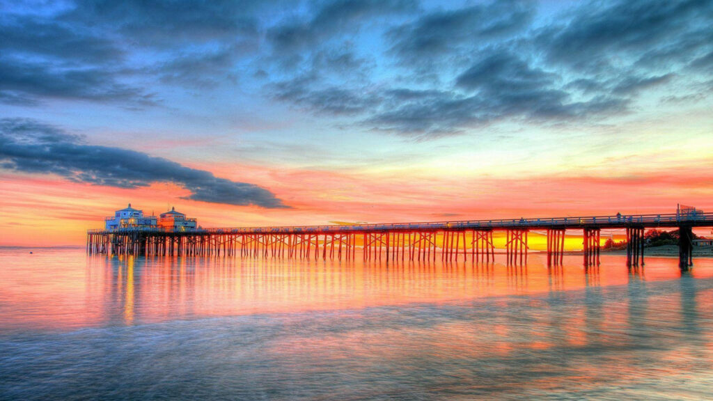 Spectacular Sunset Serenade: Majestic Malibu Pier Captured in High Definition Wallpaper